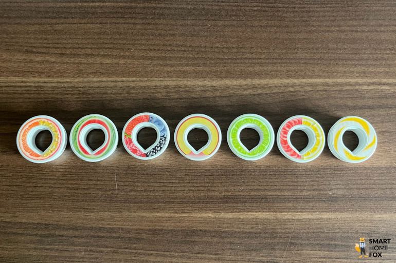 Ein Bild, welches die 7 getesteten Duft-Pods zeigt.