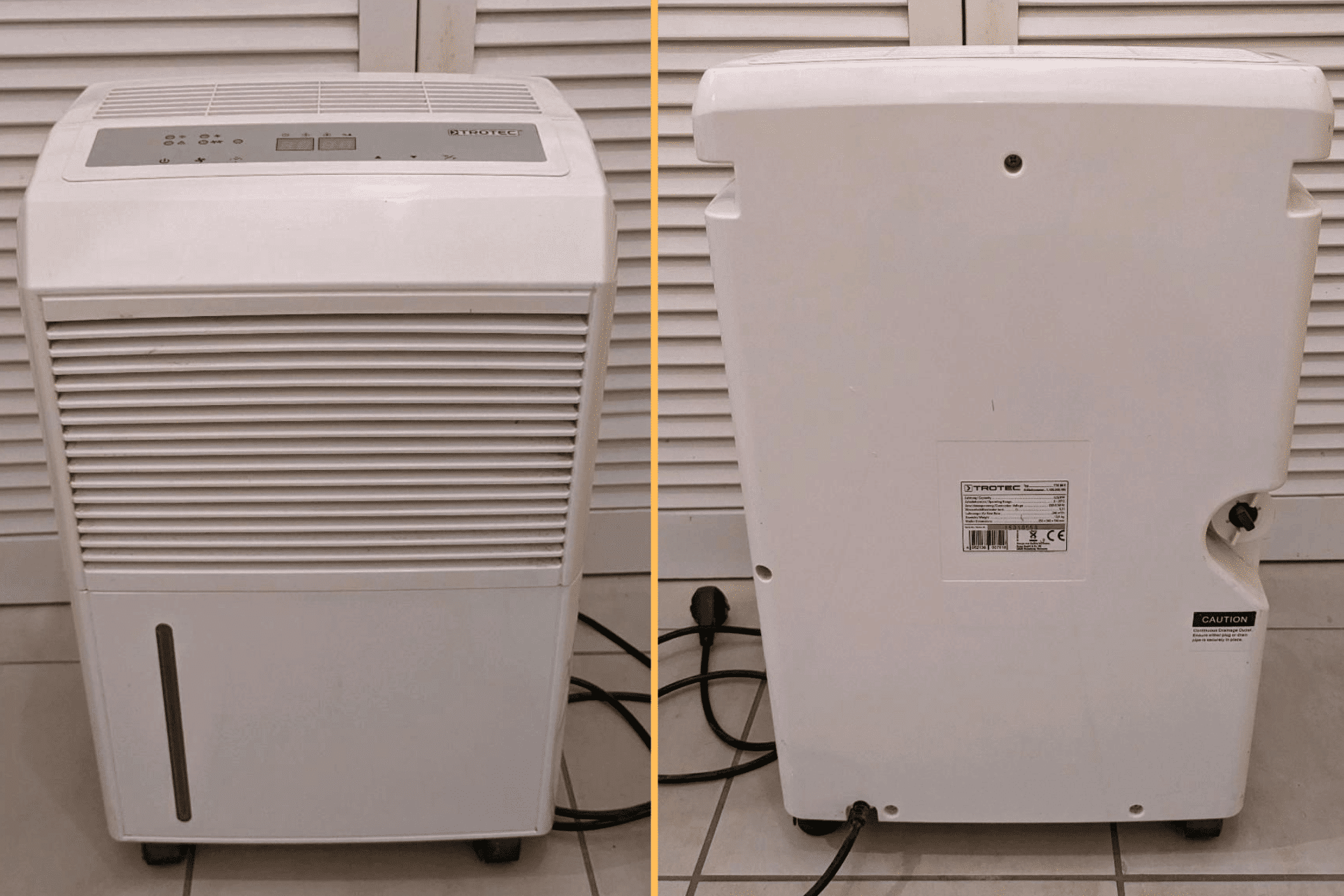 Der Trotec TTK 90 E Luftentfeuchter steht vor einer Couch auf einem Couchtisch.