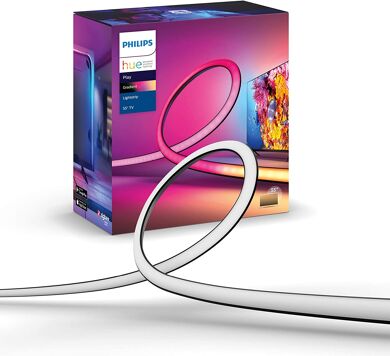 Philips Hue Lightstrip inkl. der Verpackung vor einem weißen Hintergrund