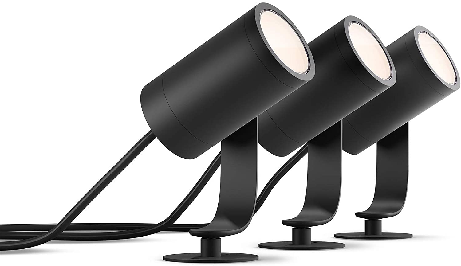 3 Philips Hue Lily Außenstrahler sind vor einem weißen Hintergrund zu sehen