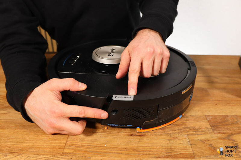 Die Edge Detect Eckenreinigungstechnologie des Shark Nevertouch ist in der Nahaufnahme zu sehen.
